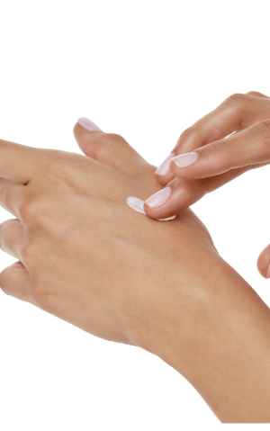 Application of cream on hands